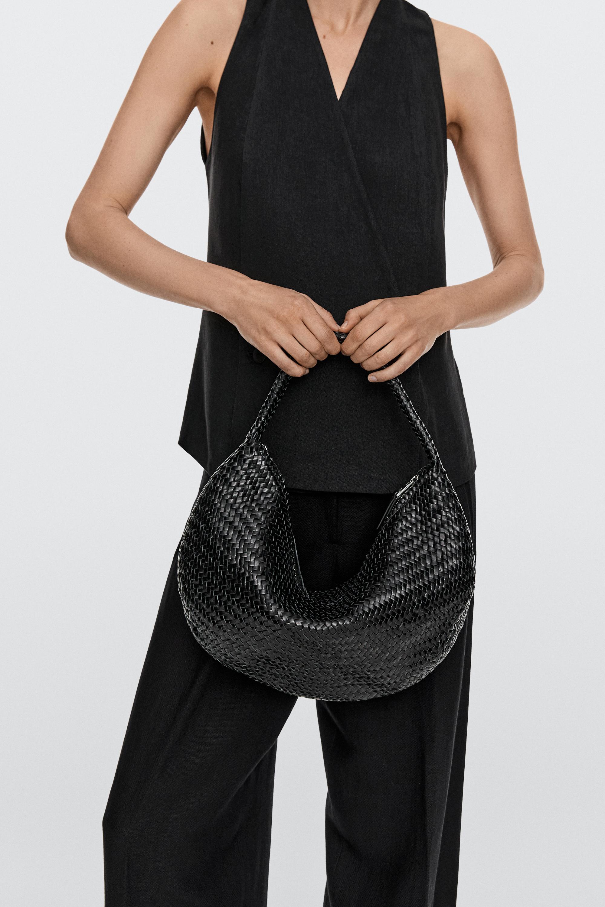 Braided leather half-moon bag